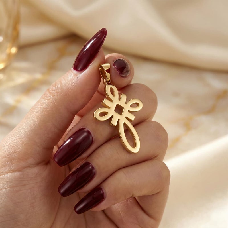 A large gold-tone cross pendant (chain not included), crafted from rust-resistant stainless steel, featuring a sleek, openwork knot design. A distinctive, modern, and spiritual piece. - Image 4